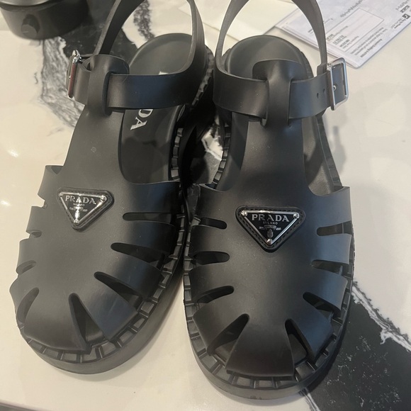 Prada Shoes - Prada black rubber fisherman sandals size 8. Worn twice excellent condition.